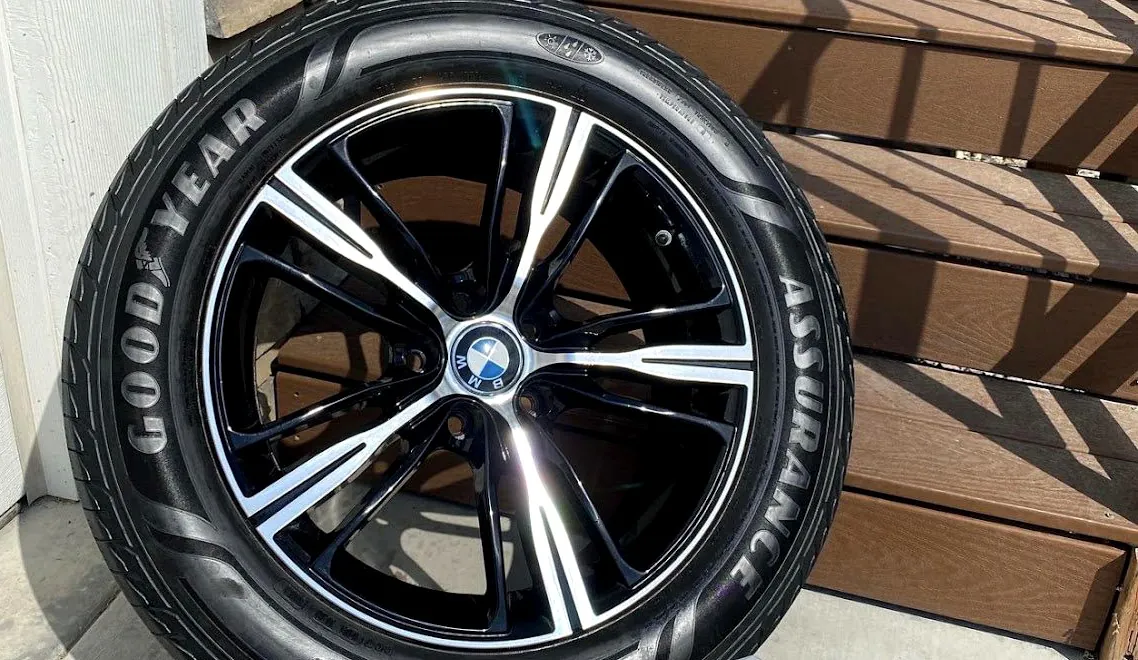 Detailed gloss-black BMW wheel after a full detail