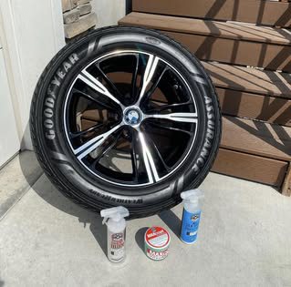 Freshly detailed wheel and tire on a porch
